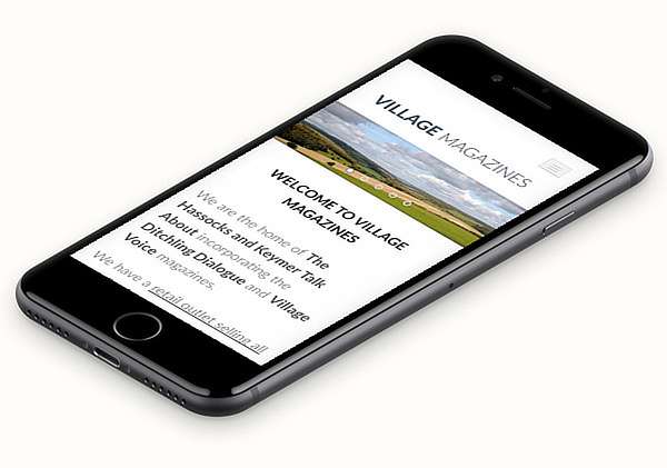 Village Magazines' website displayed in a mobile device